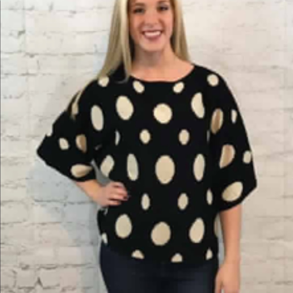 Darling black sweater with polkadots that goes just below the elbow, brand new.
